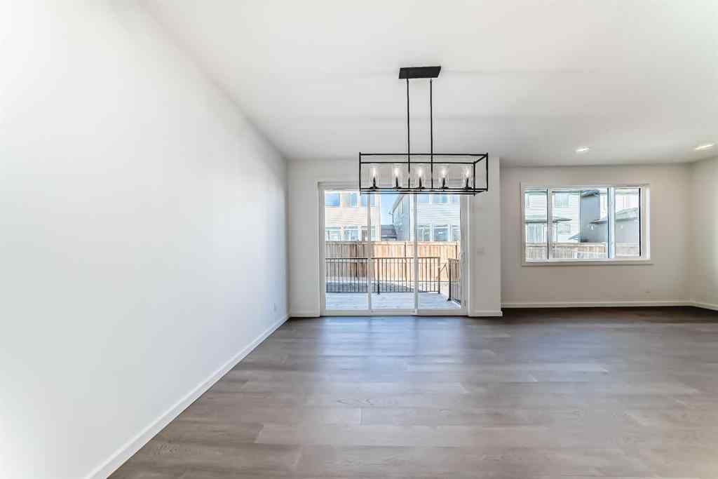 MLS® A2266517 - 52 Creekside Path SW in Pine Creek Calgary, Residential