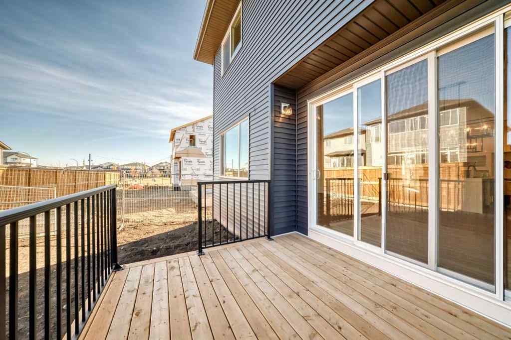 MLS® A2266517 - 52 Creekside Path SW in Pine Creek Calgary, Residential