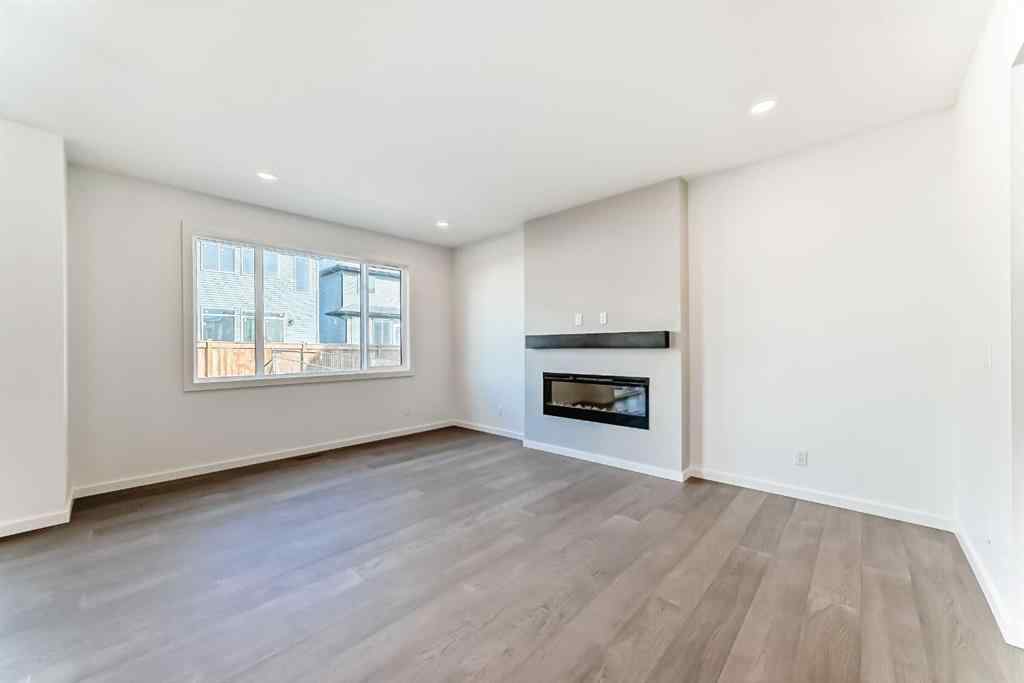 MLS® A2266517 - 52 Creekside Path SW in Pine Creek Calgary, Residential