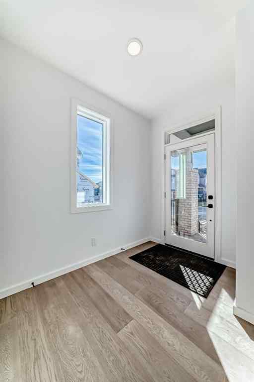 MLS® A2266517 - 52 Creekside Path SW in Pine Creek Calgary, Residential