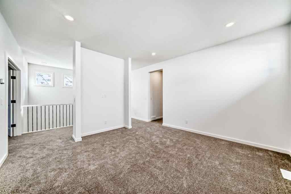 MLS® A2266517 - 52 Creekside Path SW in Pine Creek Calgary, Residential