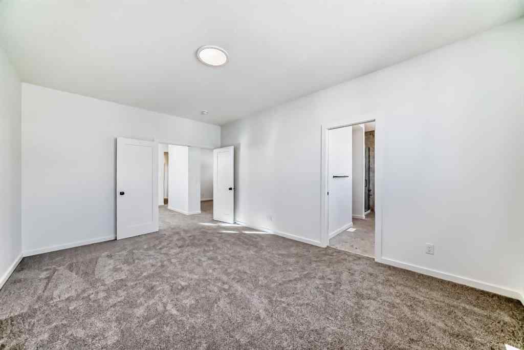 MLS® A2266517 - 52 Creekside Path SW in Pine Creek Calgary, Residential