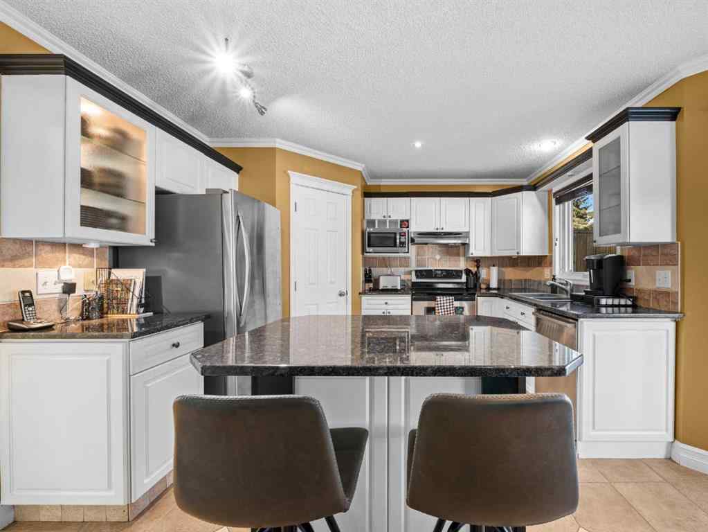 MLS® A2266526 - 9995 Scurfield Drive NW in Scenic Acres Calgary, Residential