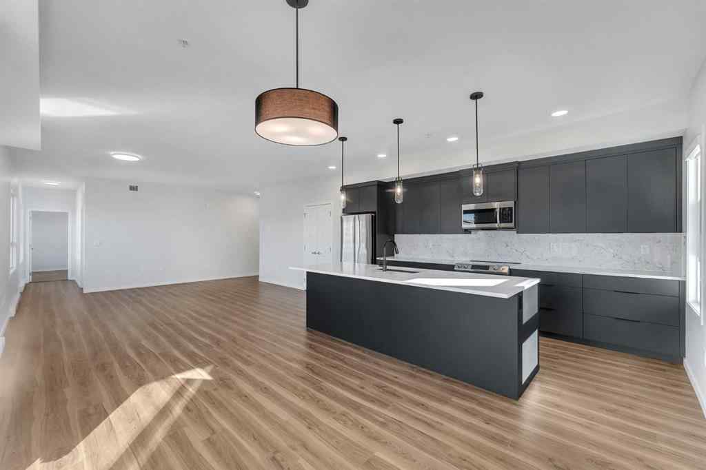 MLS® A2266548 - Unit #201 360 Harvest Hills Way NE in Harvest Hills Calgary, Residential