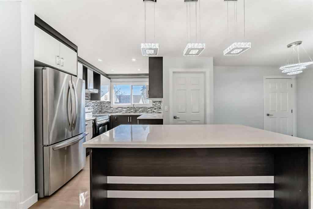 MLS® A2266568 - 207 Pinecliff Way NE in Pineridge Calgary, Residential