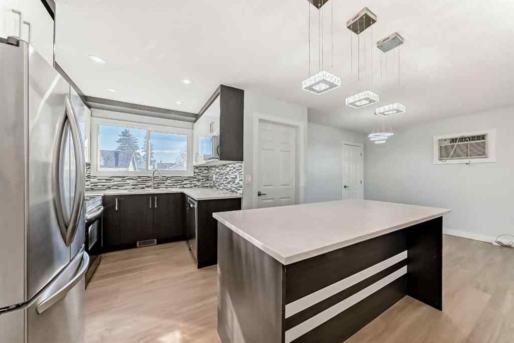 MLS® A2266568 - 207 Pinecliff Way NE in Pineridge Calgary, Residential