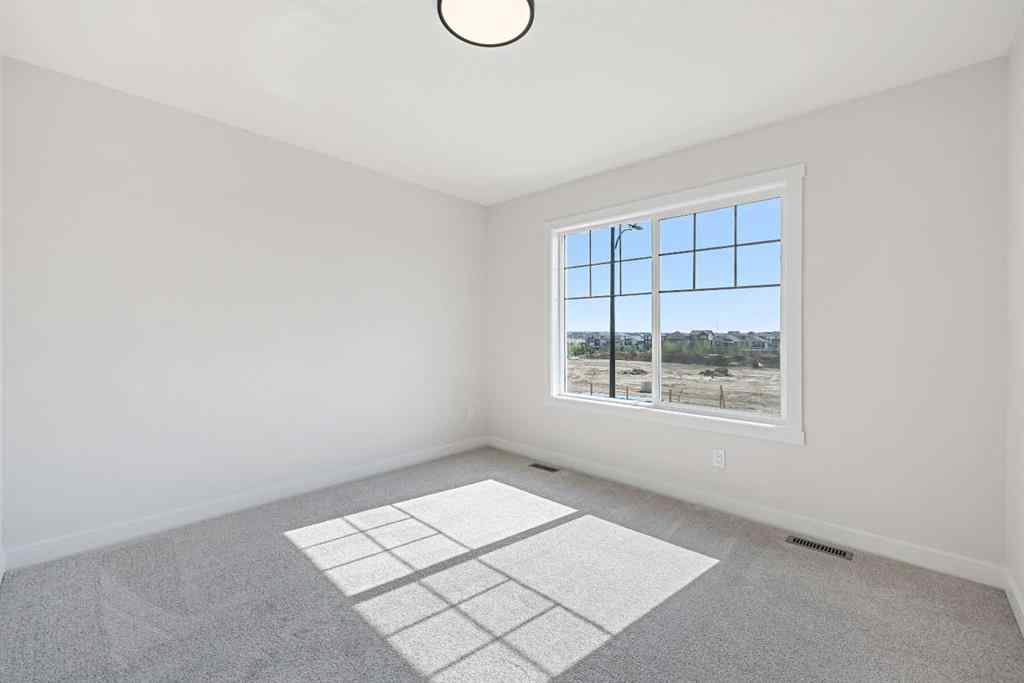 MLS® A2266583 - 634 Bayview Lane SW in Bayview Airdrie, Residential