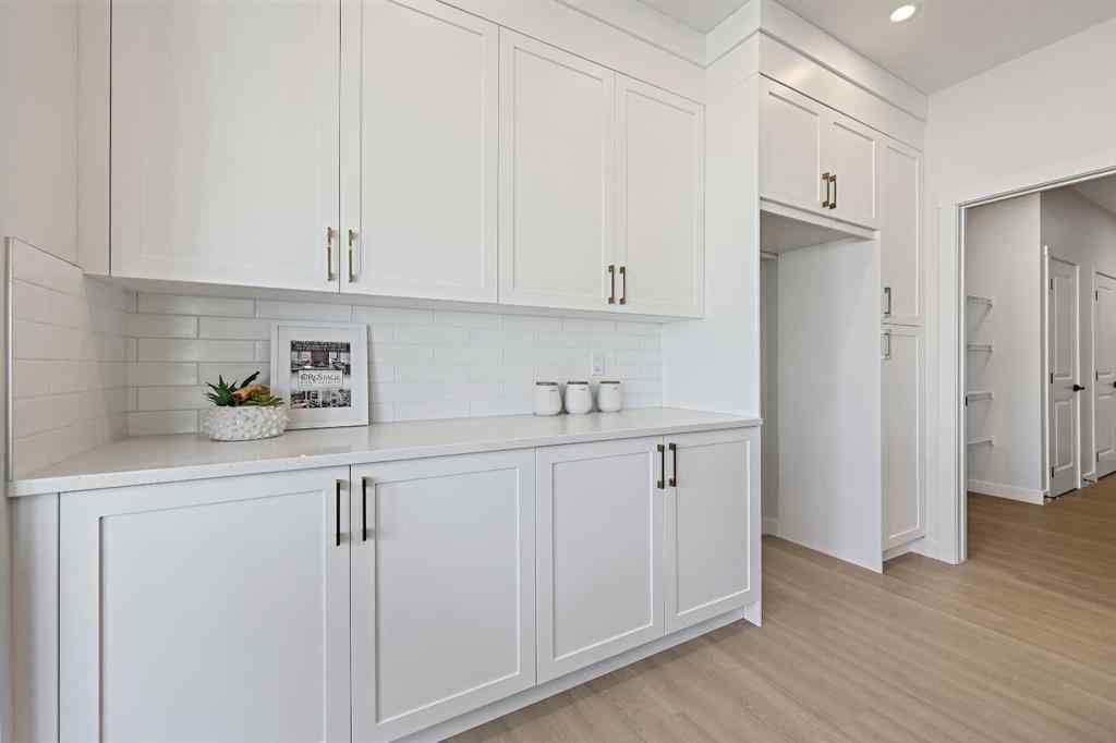 MLS® A2266583 - 634 Bayview Lane SW in Bayview Airdrie, Residential