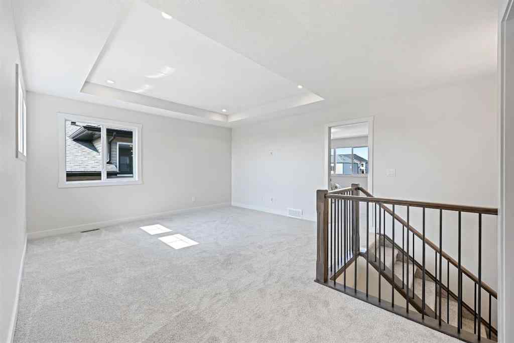 MLS® A2266583 - 634 Bayview Lane SW in Bayview Airdrie, Residential