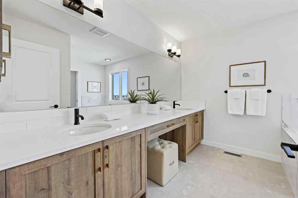 MLS® A2266583 - 634 Bayview Lane SW in Bayview Airdrie, Residential