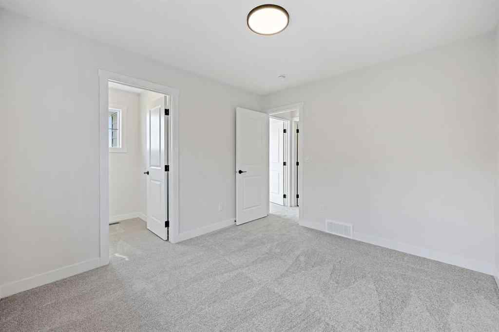 MLS® A2266583 - 634 Bayview Lane SW in Bayview Airdrie, Residential