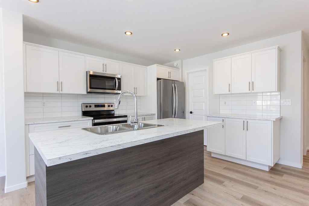 MLS® A2266584 - 17 Trinity Street  in Trinity Crossing Lacombe, Residential