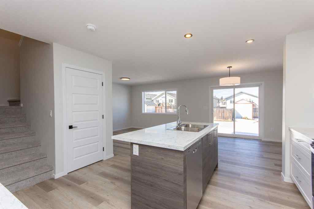 MLS® A2266584 - 17 Trinity Street  in Trinity Crossing Lacombe, Residential