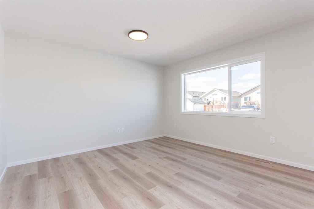 MLS® A2266584 - 17 Trinity Street  in Trinity Crossing Lacombe, Residential