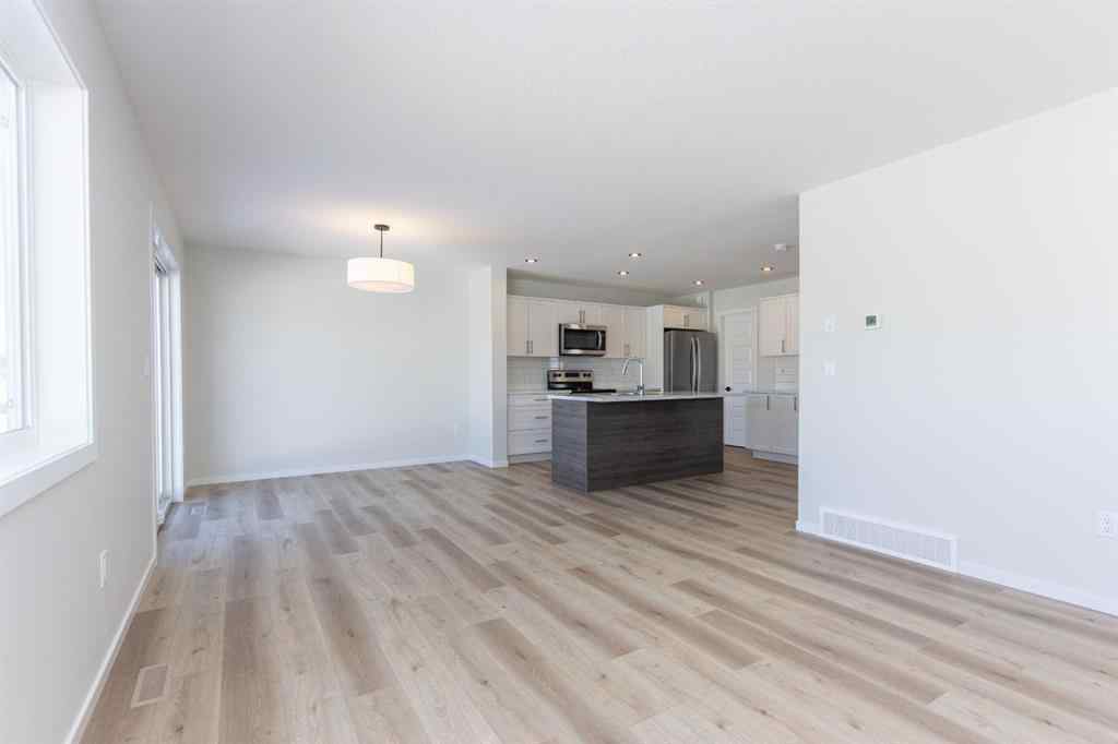 MLS® A2266584 - 17 Trinity Street  in Trinity Crossing Lacombe, Residential