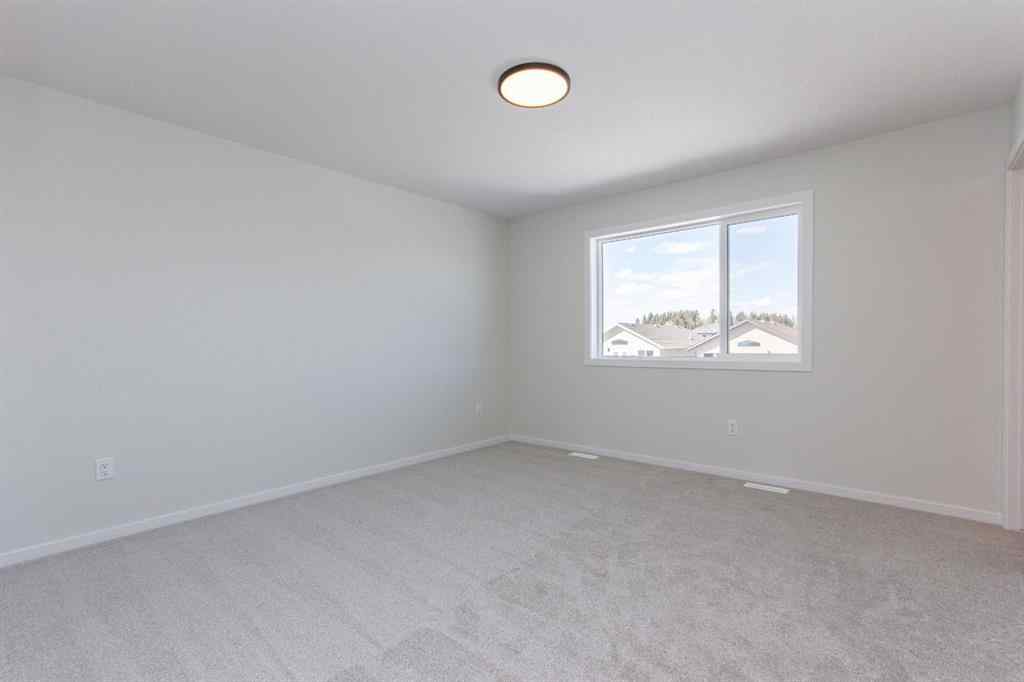 MLS® A2266584 - 17 Trinity Street  in Trinity Crossing Lacombe, Residential