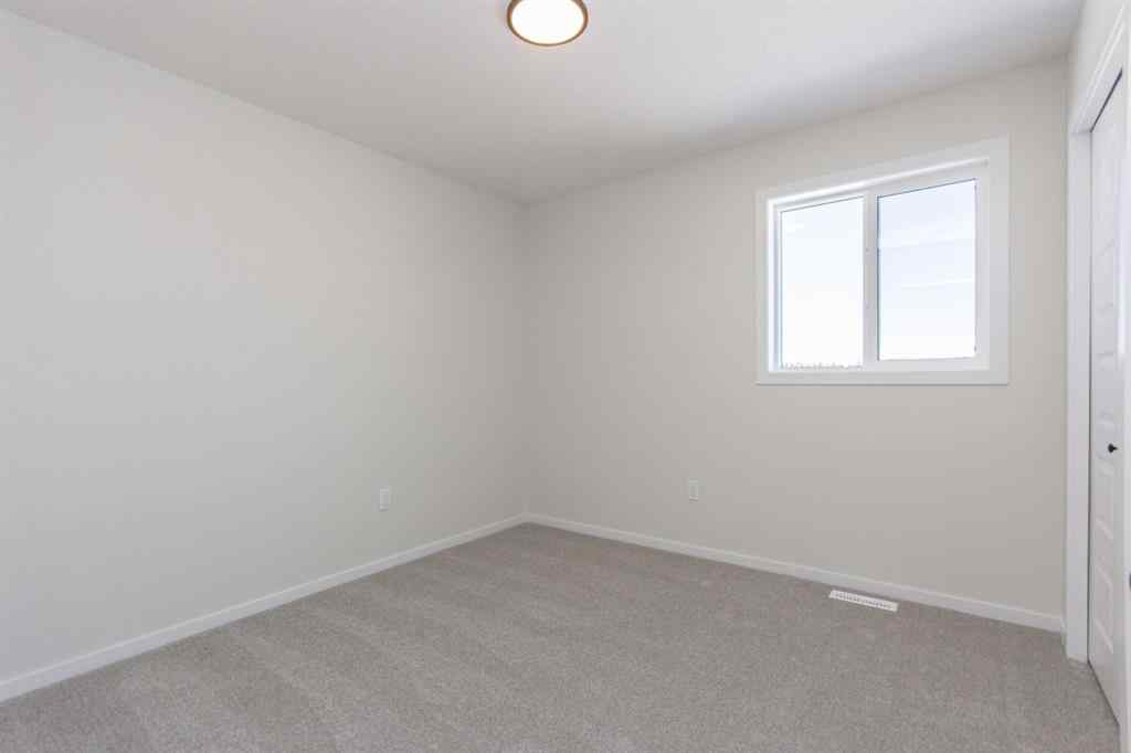 MLS® A2266584 - 17 Trinity Street  in Trinity Crossing Lacombe, Residential