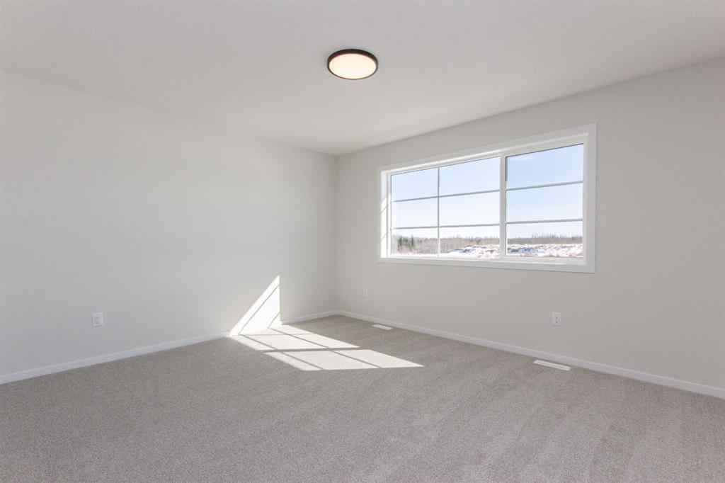 MLS® A2266584 - 17 Trinity Street  in Trinity Crossing Lacombe, Residential