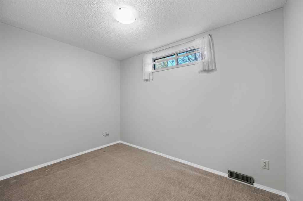 MLS® A2266586 - 11 Coach Side Terrace SW in Coach Hill Calgary, Residential
