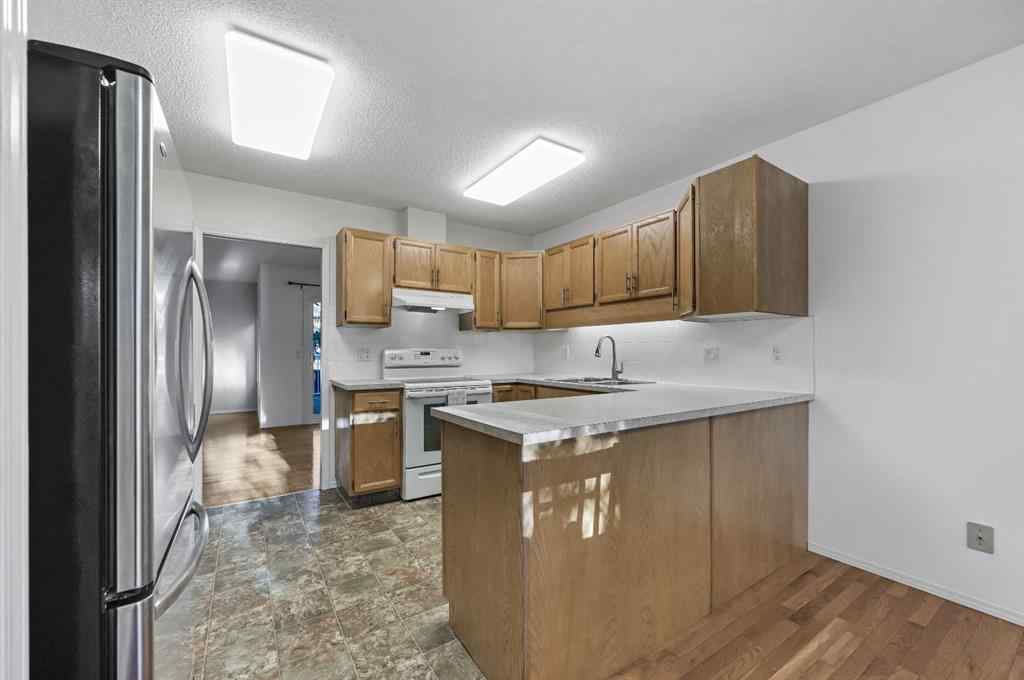 MLS® A2266586 - 11 Coach Side Terrace SW in Coach Hill Calgary, Residential