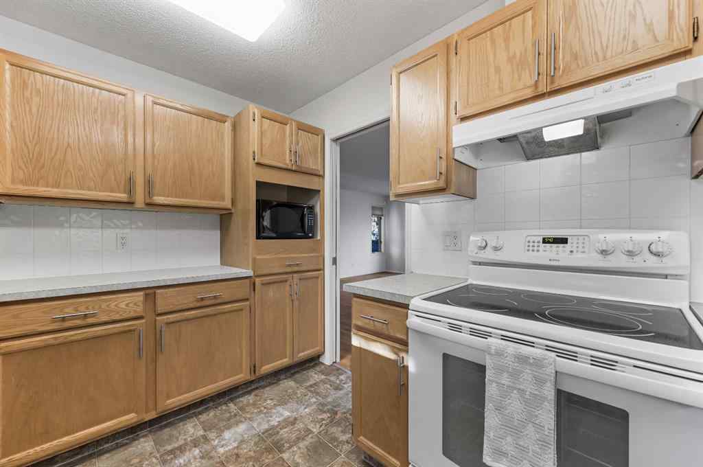MLS® A2266586 - 11 Coach Side Terrace SW in Coach Hill Calgary, Residential