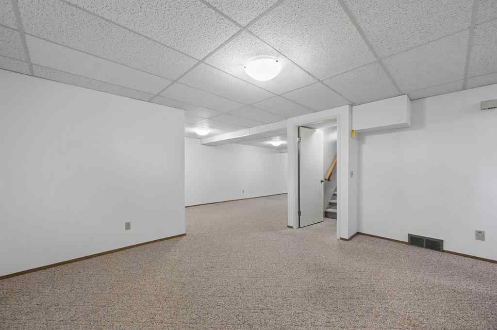 MLS® A2266586 - 11 Coach Side Terrace SW in Coach Hill Calgary, Residential