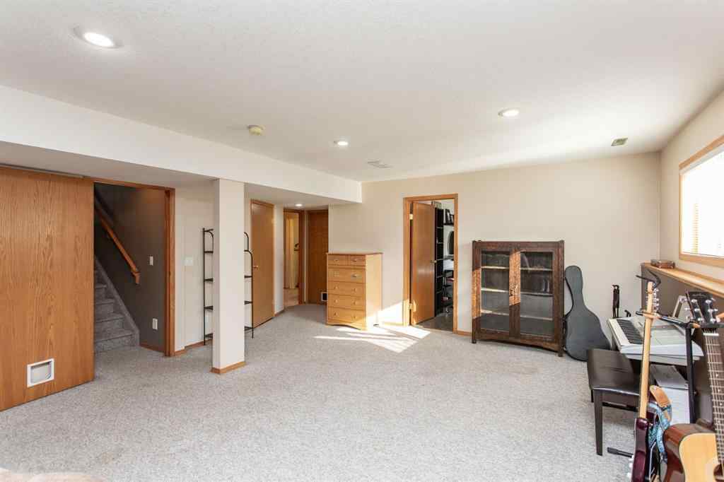 MLS® A2266601 - 179 Douglas Avenue  in Deer Park Estates Red Deer, Residential