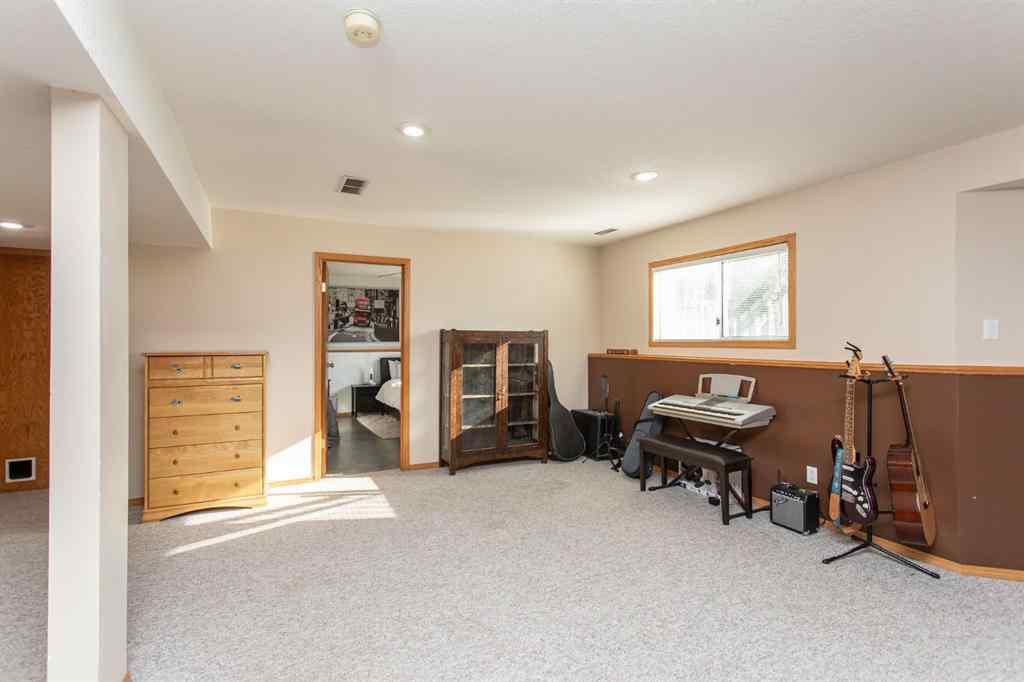MLS® A2266601 - 179 Douglas Avenue  in Deer Park Estates Red Deer, Residential