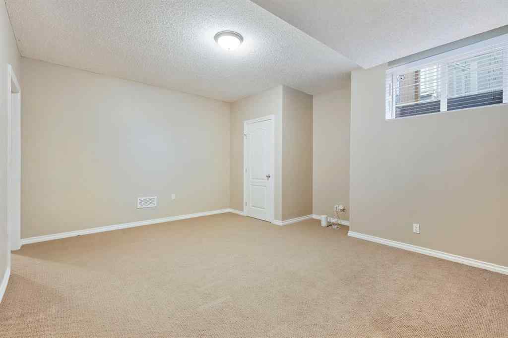 MLS® A2266610 - 199 Somme Avenue SW in Garrison Woods Calgary, Residential