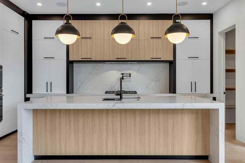 MLS® A2266611 - 342 Normandy Drive SW in Currie Barracks Calgary, Residential