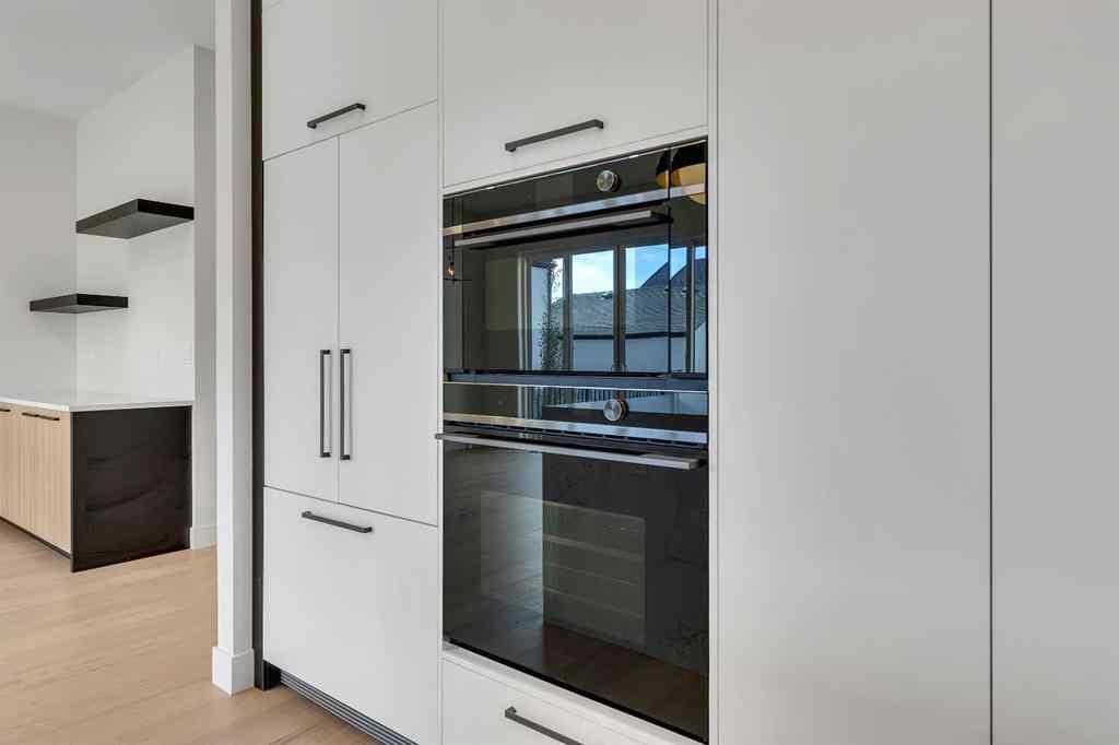 MLS® A2266611 - 342 Normandy Drive SW in Currie Barracks Calgary, Residential