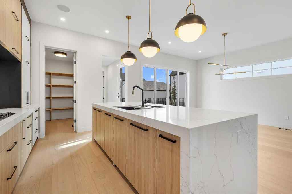 MLS® A2266611 - 342 Normandy Drive SW in Currie Barracks Calgary, Residential