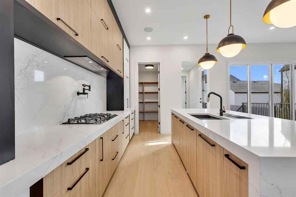 MLS® A2266611 - 342 Normandy Drive SW in Currie Barracks Calgary, Residential