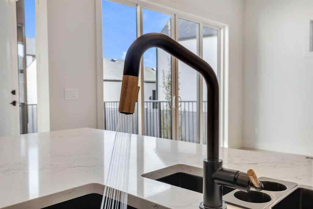 MLS® A2266611 - 342 Normandy Drive SW in Currie Barracks Calgary, Residential