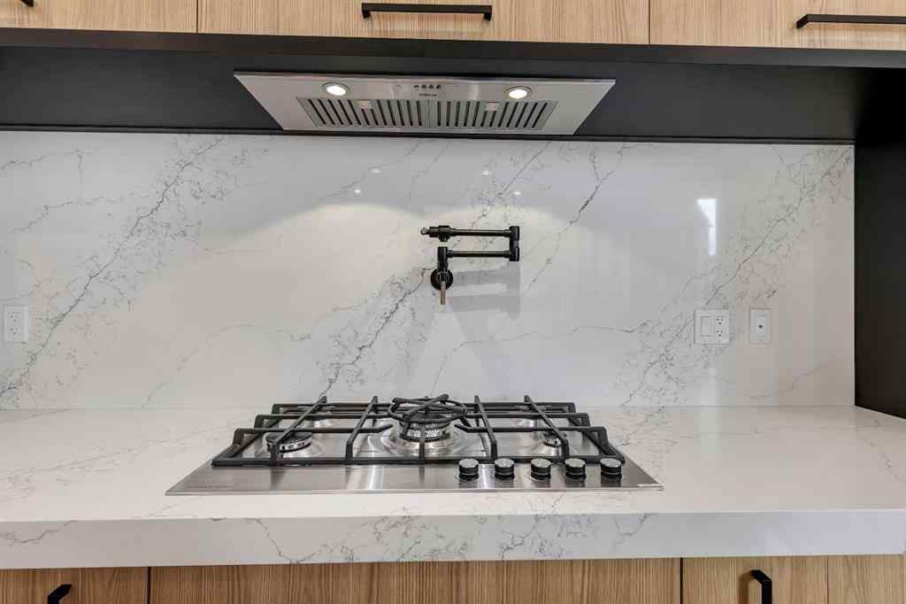 MLS® A2266611 - 342 Normandy Drive SW in Currie Barracks Calgary, Residential