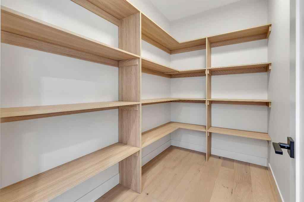 MLS® A2266611 - 342 Normandy Drive SW in Currie Barracks Calgary, Residential