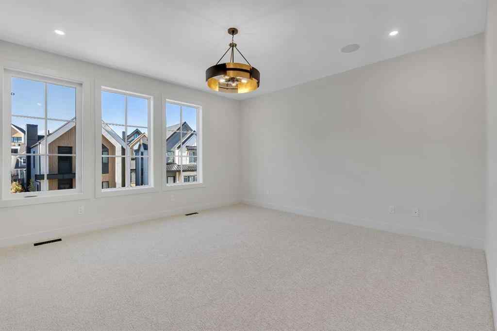 MLS® A2266611 - 342 Normandy Drive SW in Currie Barracks Calgary, Residential