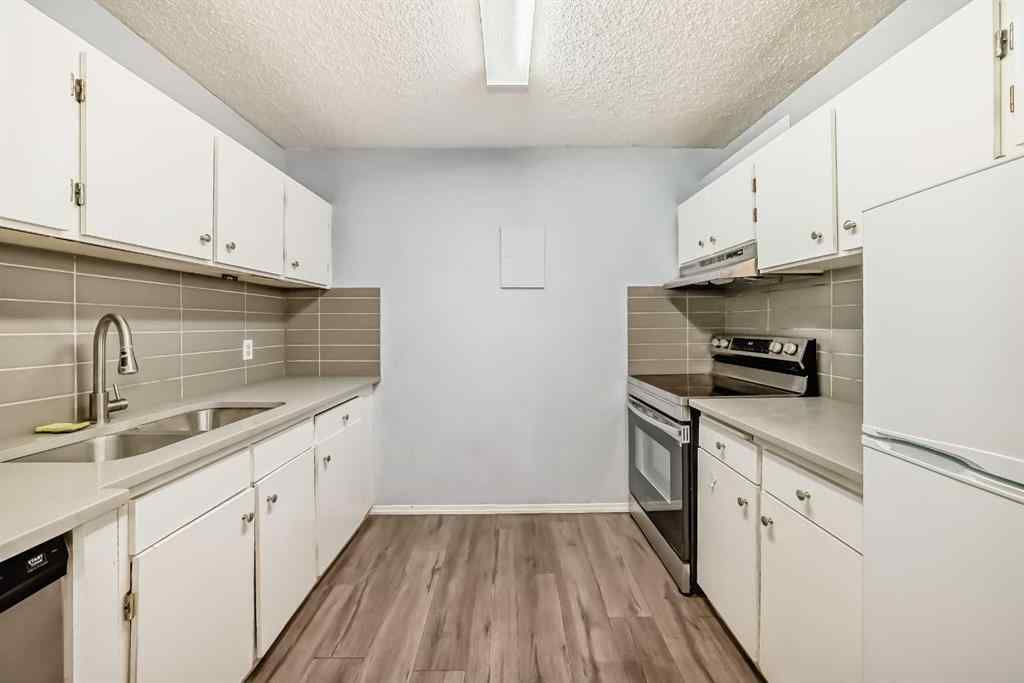 MLS® A2266616 - Unit #1406 4944 Dalton Drive NW in Dalhousie Calgary, Residential