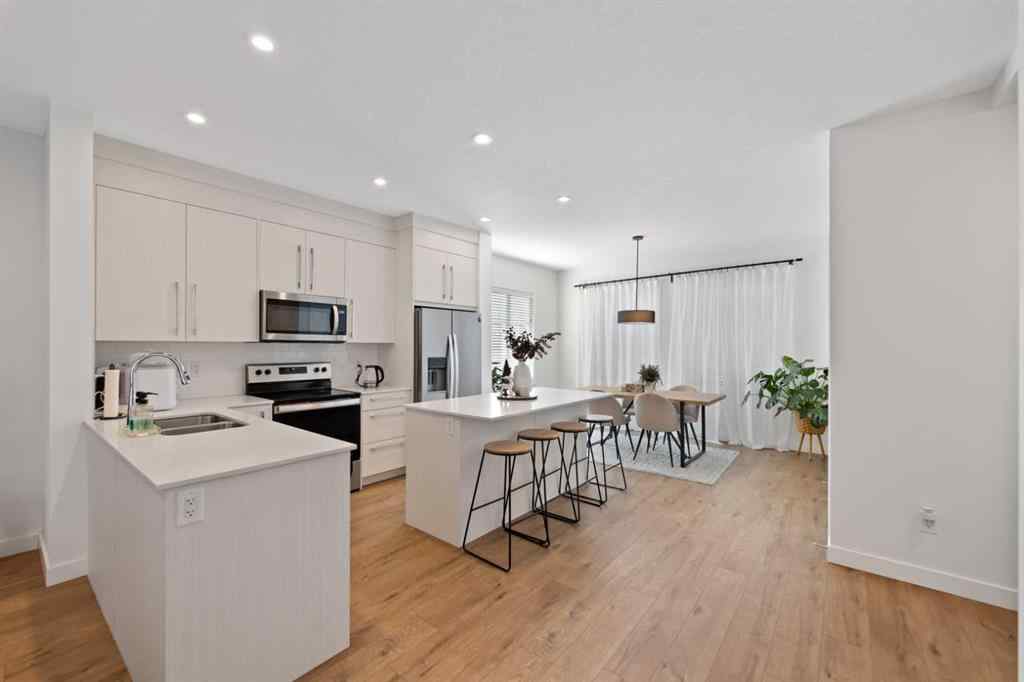 MLS® A2266637 - Unit #218 669 Savanna Boulevard NE in Saddle Ridge Calgary, Residential