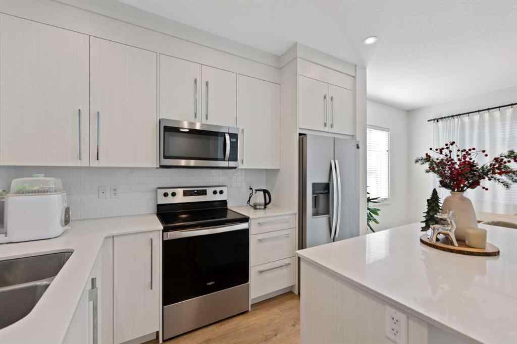 MLS® A2266637 - Unit #218 669 Savanna Boulevard NE in Saddle Ridge Calgary, Residential