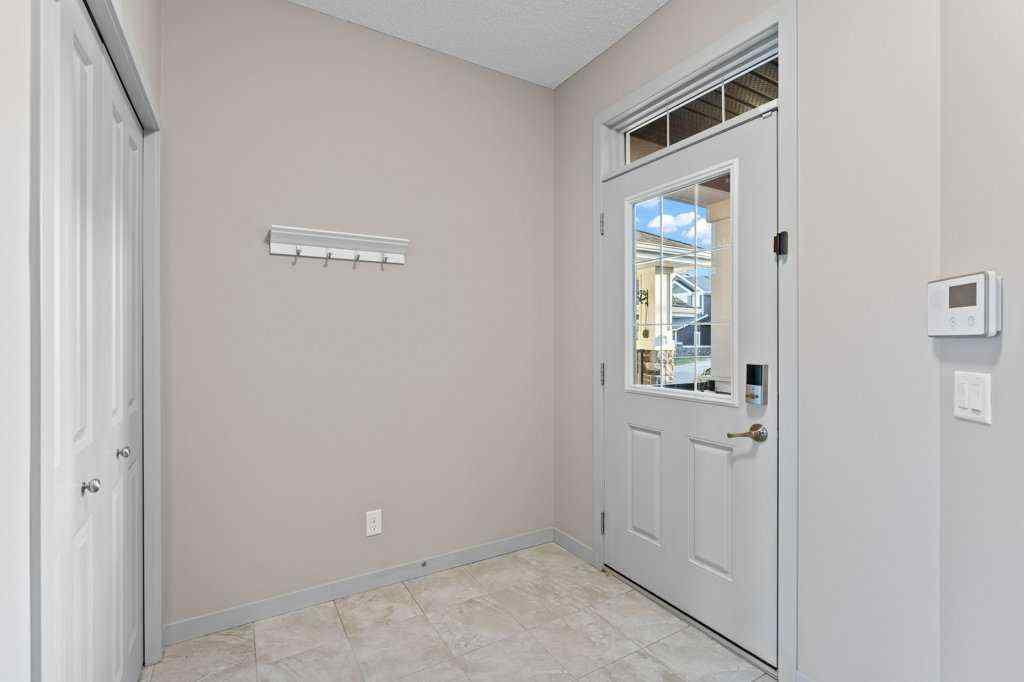 MLS® A2266647 - 251 Sunrise View  in Sunset Ridge Cochrane, Residential