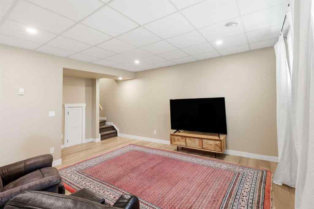 MLS® A2266655 - 306 Cottageclub Link  in Cottage Club at Ghost Lake Rural Rocky View County, Residential