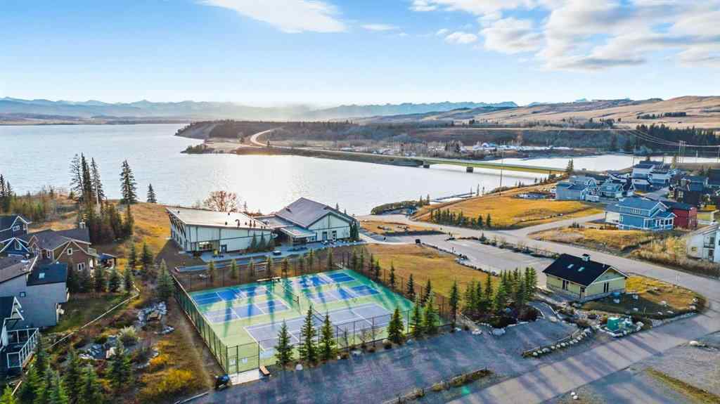 MLS® A2266655 - 306 Cottageclub Link  in Cottage Club at Ghost Lake Rural Rocky View County, Residential