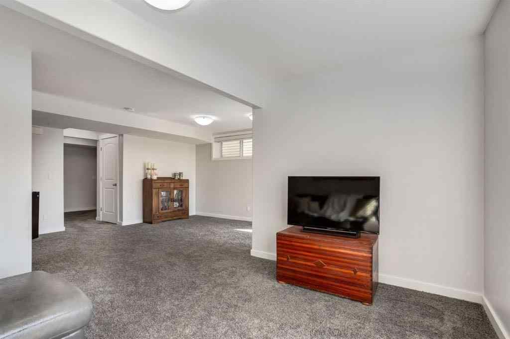 MLS® A2266663 - 251 Kingsbridge Road SE in Kings Heights Airdrie, Residential