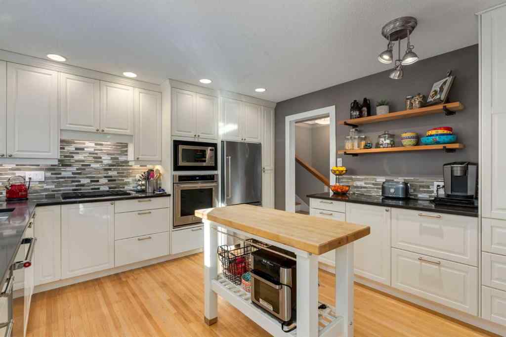 MLS® A2266665 - 12044 Lake Emerald Crescent SE in Lake Bonavista Calgary, Residential