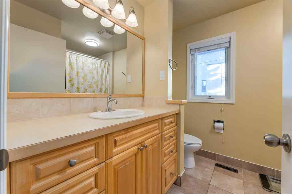 MLS® A2266665 - 12044 Lake Emerald Crescent SE in Lake Bonavista Calgary, Residential