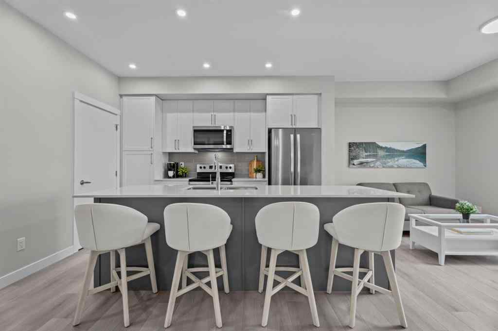 MLS® A2266695 - Unit #2406 100 Banister Drive  in Wedderburn Okotoks, Residential