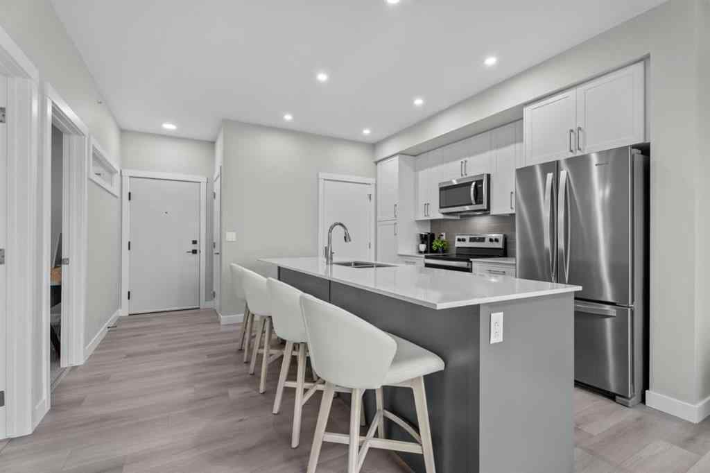 MLS® A2266695 - Unit #2406 100 Banister Drive  in Wedderburn Okotoks, Residential