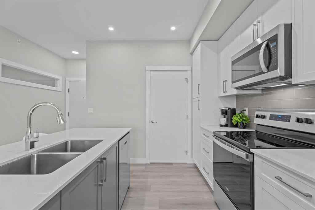 MLS® A2266695 - Unit #2406 100 Banister Drive  in Wedderburn Okotoks, Residential