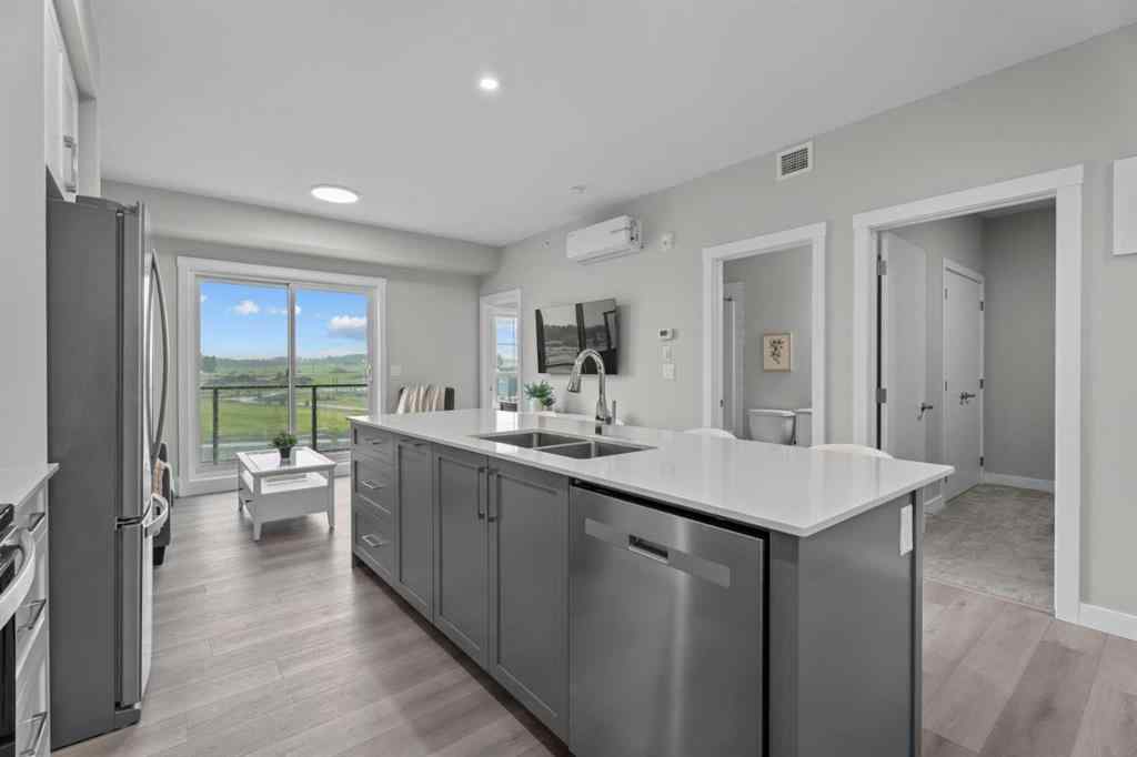 MLS® A2266695 - Unit #2406 100 Banister Drive  in Wedderburn Okotoks, Residential